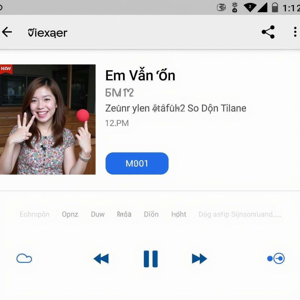 Hình ảnh hiển thị giao diện phát nhạc bài hát "Em Vẫn Ổn" trên Zing Mp3, với các nút điều khiển, thông tin bài hát và nghệ sĩ.